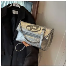 Crossbody Bag New Counter Quality Fashion New Sier Underarm Bag for Women with High Quality and Small Style Spicy Girl Dingdang Handheld Middle Age Sin Bag