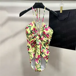 Blommigt tryck sexig halter baddräkt designer bikini för kvinnor design ihåliga baddräkter lyxiga badkläder biquini