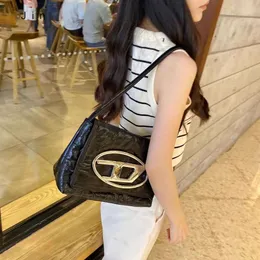 حقيبة Crossbody Crossbody جودة جديدة للأزياء الجديدة الإبطية الحقيقية للنساء ذات الجودة العالية وصغيرة الحجم على نمط الفتاة الحار Dingdang Handheld Middle Ag Sin Bag