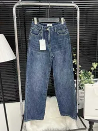 Nanyou alta qualidade ce saco traseiro carta coçando calças jeans femininas aparência fina versão correta na moda