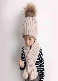 Шапки Шапки Besar Nyata Bulu Шапка с помпоном Syal Set Anak Musim Dingin Rajutan Wol Tebal Beanie Topi untuk Anakanak Usia 310 T2209072469024