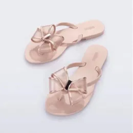 Floplar Yeni Varış Kadınlar Yay Flipflop Melissa Aynı Stil Bayanlar Jöle Ayakkabı Moda PVC Brezilya Plajı Sandalet Terlik SM103 SM105