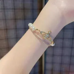 Planet Fashion Design Stesso braccialetto di perle di Saturno Personalizzato Bracciale femminile versatile, leggero, di lusso, elegante e di fascia alta