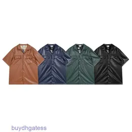 Mężczyzny projektantki marki Casual Shirts Rhude New American High Street Loose Fashion Wszechstronny męski para letnia skórzana koszula z krótkim rękawem zewnętrzna