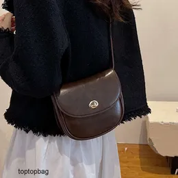 Designer Luxury fashion Shoulder bags Womens Bag Lock Buckle Saddle Bag Fashionable and Versatile Western Style One Shoulder Crossbody Small Bag