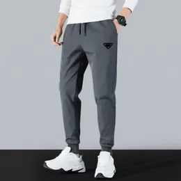 Mode mens byxor designer sweatpants sportbyxor högkvalitativ bomullsjoggare som kör byxor avslappnade snabba torkbyxor fitness byxor mode gata byxor