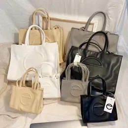 TOTE TOAK Designer Torba 2 rozmiary torby na ramię Pochette Miękka skórzana mini torebki Kobiet torebki Crossbody Luksusowe TOTE Modne Zakupy Różowe białe torebki torby