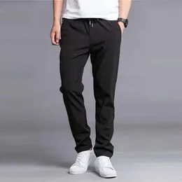Męskie zimowe ciepłe spodnie swobodne sporne spodnie wełniane gęstne spodnie luźne sporty do joggingu sporne spodnie 240325