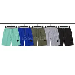 Lässige kurze Designer-Shorts mit einer Linse und Tasche, lässig, gefärbte Strandshorts, Badeshorts, Outdoor-Jogging, lässig, schnell trocknend, CP-Shorts M-2XL