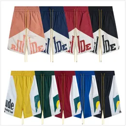 Rhude Designer-Shorts, Herren-Shorts, Strandhose zum Schwimmen, Street-Hipster, Hipster-Buchstabendruck, Camo-Sport, entspannt, Netz-Polyester, entspannte Badeshorts mit Buchstaben, A5