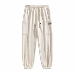 Męskie wiosenne spodnie cargo khaki faux zamszowe swobodne spodnie luźne spodnie do joggingu High Street Harajuku odzież skórzane spodnie Nowe r9m7##
