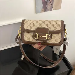 30% zniżki na designerską torbę 2024 torebki Pigło Nos na jedno ramię Crossbody Women popularny w tym roku prosty kolor kontrastowy mały i wysokiej klasy drukowany dla kobiet