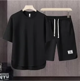 Mens coreano moda waffle duas peças conjunto verão manga curta camiseta e shorts soltos conjuntos de roupas de grife masculino