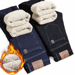 冬の暖かいフリースジーンズメン2023ストレートストレッチ厚いカジュアルデニムパンツオスのブシンワークズボン新しい男性衣類U1y＃