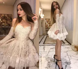 2018 Abiti da ballo corti in pizzo sexy Sweetheart maniche lunghe Tutu senza schienale Champagne Abiti da festa corti Custom Made6951780