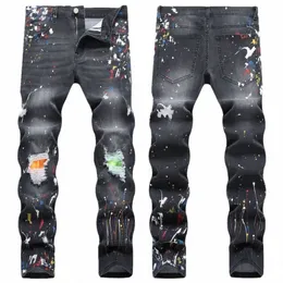 Wielki rozmiar 40 42 Europa Fi Style Men Jenas Dżinsowe spodnie drukowana dziura w paski chude spodnie szczupłe czarne dżinsy dla męża 1151 W0XZ#