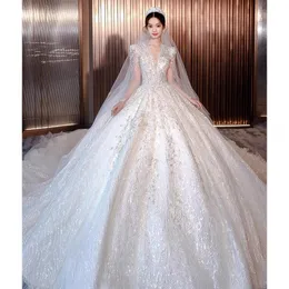 Abiti da sposa arabi con paillettes Cristalli Abito da ballo con perline in pizzo a maniche lunghe trasparenti vestido de novia Abito da sposa Abito da sposa vintage Personalizza Abito da sposa di lusso arabo