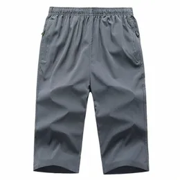 swobodne męskie spodnie cielęce Pants Mężczyźni Summer Mens Beach Krótkie spodnie Krótkie spodnie Homme Brand Ubranie Szybkie suche sport 97 O0CH#