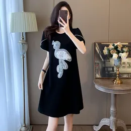 2024 sommar ny super smal design med söt bubbla lösa klänningar för kvinnor korta ärmar temperament liten svart kjol