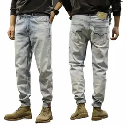 النمط الكوري fi الرجال الجينز الرجعية الفاتح الأزرق عالي الجودة امتداد سليم النحافة جينز Men Vintage Designer Denim Pants Hombre Z1ac#