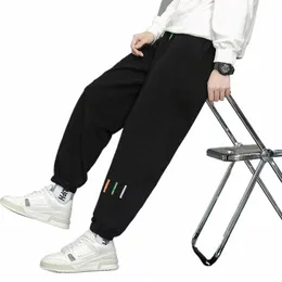 Side Striped Casual Pants Mężczyźni Owporne workowate szerokie spodnie nogi sprężyste talia joggery streetwearne Fi Harajuku Pants 7xl D2H9#