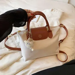 Loja crossbody saco barato exportação 2024 verão nova moda feminina ombro pequena e tendência popular grande capacidadeeqds