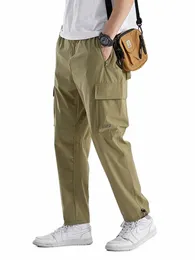 Summer Szybkie suche męskie spodnie wielkie rozmiar 8xl Multi-Pockets luźne spodnie dresowe praca joggery zwykłe proste lg spodnie męskie d1qo#