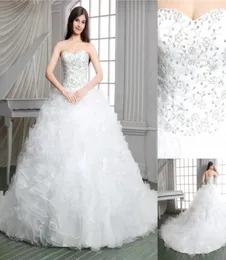 Immagini reali Abito da ballo Abiti da sposa firmati da chiesa Applique di lusso Con lacci Corte dei treni Abiti da sposa trasparenti Sweetheart Ruffled4127228