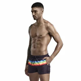 Vendita calda Mens Holiday Rainbow Striped Beach Pantaloni corti Uomo Coulisse Pantaloncini casual con tasca Pantaloni sportivi da jogging da allenamento maschile D43P #