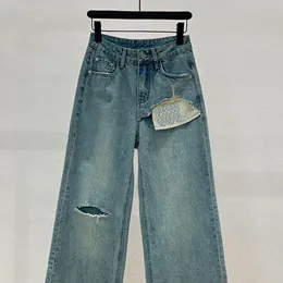 Lyxdesigner kvinnor jeans bokstav blå denim jean byxor hål design casual woman byxor