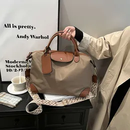 Factory Shoulder Bag Store Kostenloser Versand Oxford Cloth Fitns Damen Neue Mode und Knödel Vielseitige farbige Umhängetasche Leichtgewicht