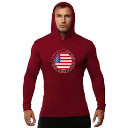 Sportowa koszula z kapturem mężczyźni Fitn bieganie T-shirt Catmel oddychający rękaw LG Autumn Clothing Gym Kulturysty