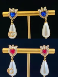 Rhinestone kalp şeklindeki inci damla küpeler Zarif mizaç tasarımcısı kadınlar için küpeler parti ev tasarımcısı mücevher ücretsiz posta.