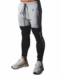 2020 nuovi pantaloni skinny da uomo palestra patchwork Fitn pantaloni da pista da corsa maschili pantaloni sportivi da uomo pantaloni da allenamento sportivi x4c6 #