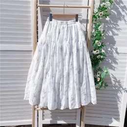 Kjolar mild bomull kjol kvinnlig vår sommar mitten längd blommig paraply bantning a-line