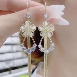 Designer Lucky Clover Super Immortal Green Cat's Eye Stone Flower Tassel Earrings with A Sense of Temperament, Long Hollow Flower Inlaid Diamond Earrings