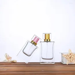 Lagringsflaskor yuxi vit transparent glas parfymflaska 30 ml50 ml platt fyrkantig bajonett bärbar sprayflaska.