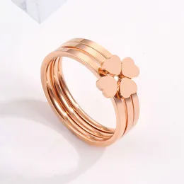 Hot selling creative three piece set for couples, titanium steel four leaf clover ring, women's peach heart three in one combination fashion ring size 5/6/7/8/9/10