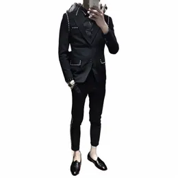 Stile britannico monopetto 2 pezzi giacca + pantaloni rivetto vestito da uomo casual parrucchiere abiti da ballo sociale discoteca abbigliamento uomo 88sQ #