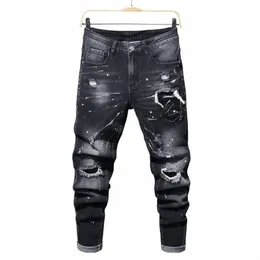 Nya casual rippade hål jeans för mäns färgprickar bläck sprutad mjuk stuga hög elastisk läderetikett svart grå smal byxor d2m7#