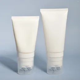 Garrafas de armazenamento compactas vazias reutilizáveis suporte de garrafa de tubo de silicone macio com bolas de rolo de aço para loção de creme de shampoo