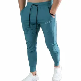 Nowi mężczyźni homme streetwear jogger fitn kulturystyka hombre spodnie dresowe spodnie mężczyźni