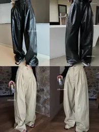 Pantaloni da donna 2024Designer di lusso famoso con coulisse di alta qualità gamba larga per uomo Pantaloni in pelle PU maschile sexy Coiol