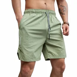 mężczyźni gorące szorty Lekkie cienkie krótkie spodnie bieganie przysiadowe szorty Mężczyznę na siłownię noszenie szybkich suszących sznurków m1wg#