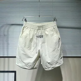 Shorts de trabalho bordados na moda de verão para homens casuais soltos 5/5 calças, shorts de praia de secagem rápida na moda