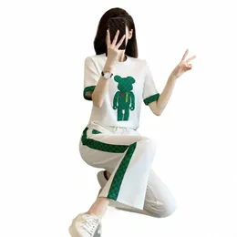 tute coreane casual da donna primavera estate nuovi vestiti Fi T-shirt a maniche corte top e pantaloni 2 set a due pezzi donna T11x #