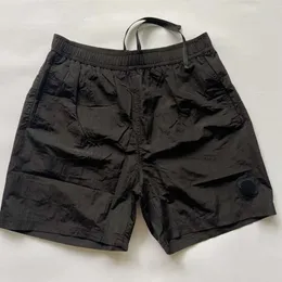 2024 Pantaloncini da spiaggia in pietra all'aperto per uomo Primavera ed Estate Kpop Swim Island Pantaloni da palestra Abbigliamento maschile Pantaloni da basket ad asciugatura rapida kgi668