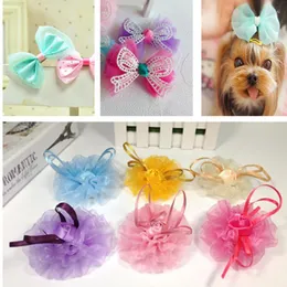 犬アパレルペットヘッドドレススノーヤーンボウヘアピンジュエリーアクセサリー20pcs/lot犬クリップ