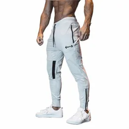 2023 i più nuovi uomini pantaloni della tuta palestre Fitn pantaloni sportivi Bodybuilding Jogging pantaloni da allenamento da uomo in esecuzione Cott pantaloni a matita da uomo h1PA #