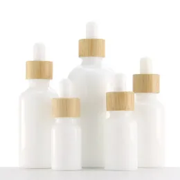 wholesale Bottiglie di olio essenziale di vetro di porcellana bianca Flacone contagocce di siero per la cura della pelle con pipetta di bambù 10 ml 15 ml 20 ml 30 ml 50 ml 100 ml ZZ